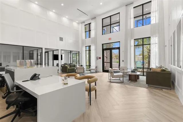 a view of a living room and dining room