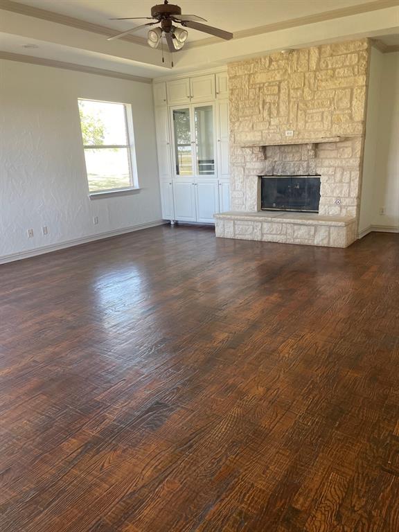 14140 Highway 78 Blue Ridge, TX 75424 - Photo 11 of 30 an empty room with windows and fireplace