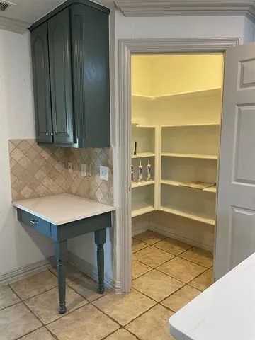 a room that has a couch and a table in it