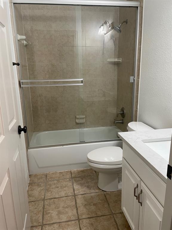 14140 Highway 78 Blue Ridge, TX 75424 - Photo 21 of 30 a bathroom with a toilet a sink and shower