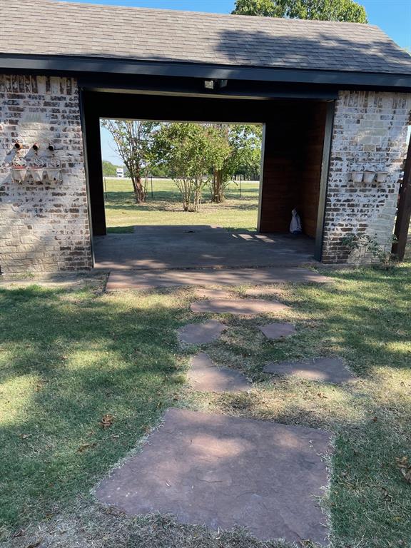 14140 Highway 78 Blue Ridge, TX 75424 - Photo 28 of 30 a view of a backyard of a house