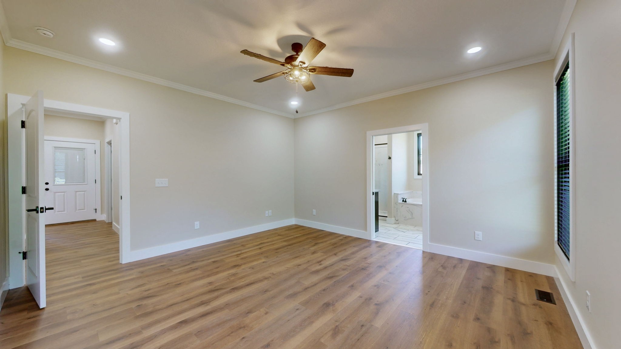 865 Alman Cemetery Road Paris, TN 38242 - Photo 14 of 41 wooden floor in an empty room with a window