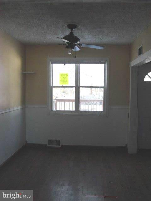 406 Old Home Road Baltimore, MD 21206 - Photo 6 of 11 an empty room with a window