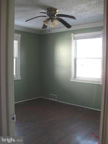 406 Old Home Road Baltimore, MD 21206 - Photo 9 of 11 a view of a room that has a window in it