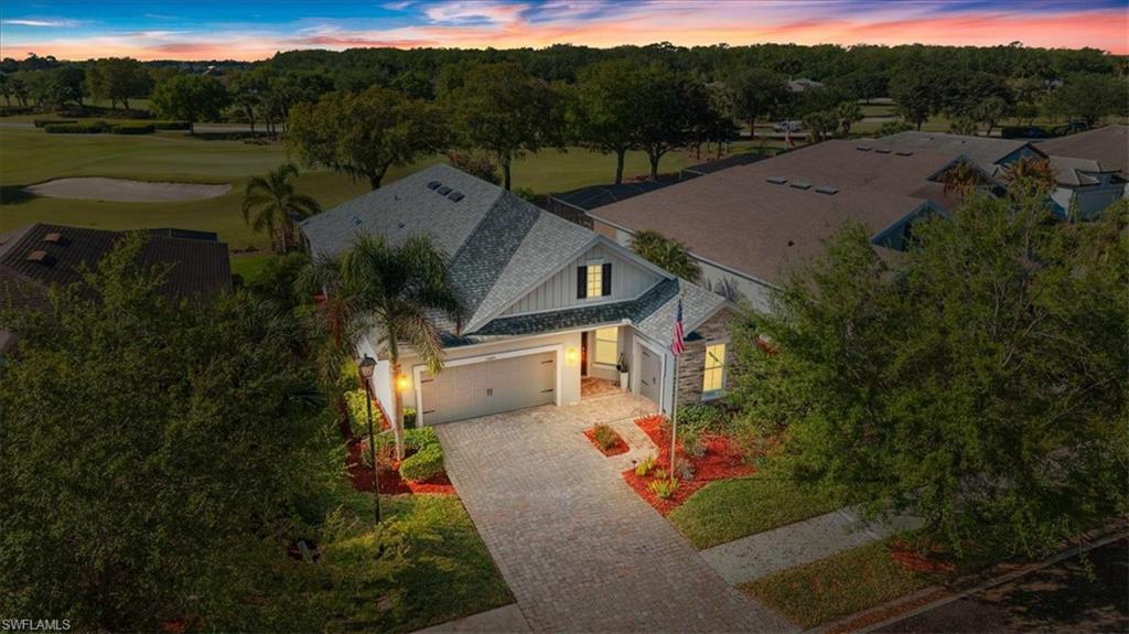 a view of a street with a building in the background