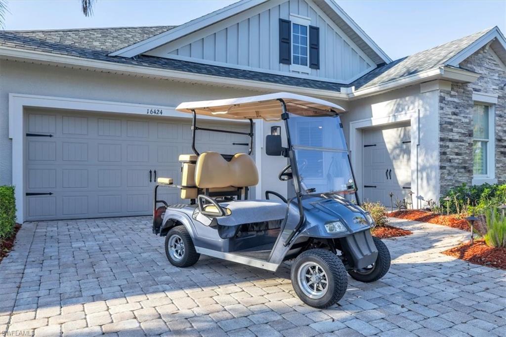 16424 Windsor Way Alva, FL 33920 - Photo 2 of 50 a car parked in front of garage