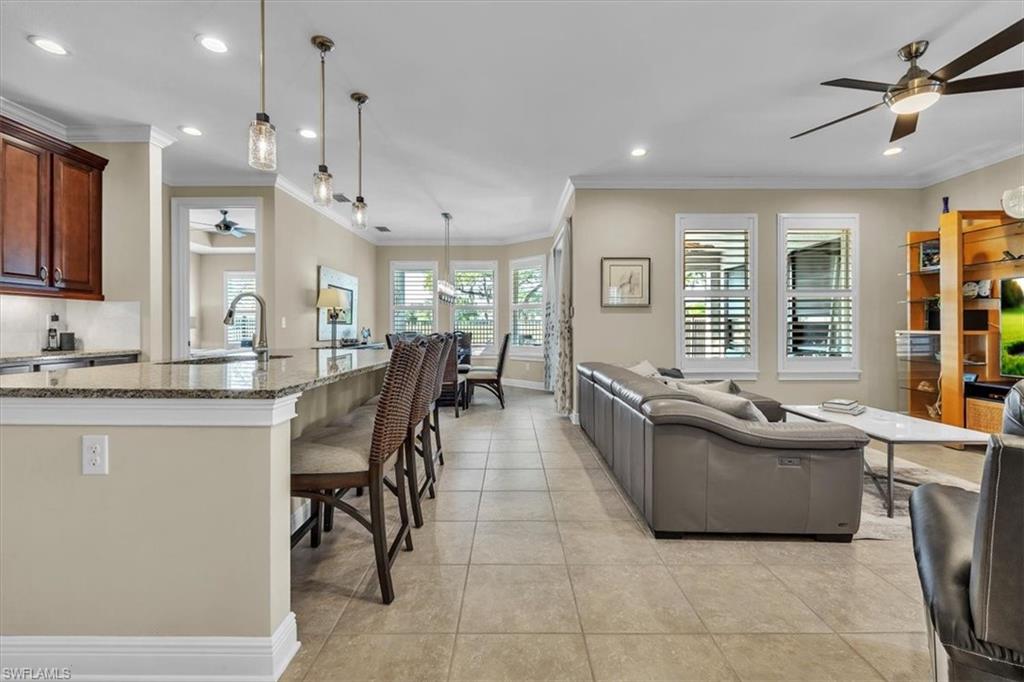 16424 Windsor Way Alva, FL 33920 - Photo 9 of 50 a living room with furniture and a large window