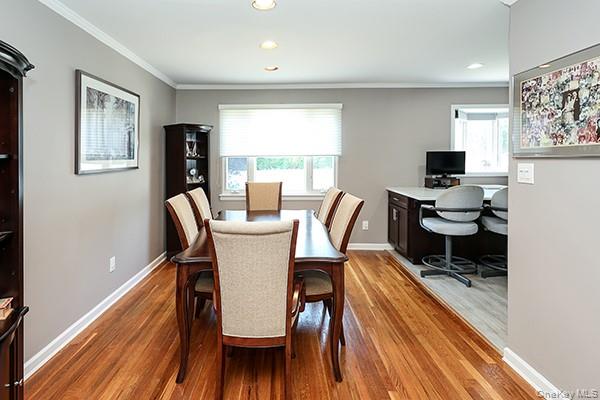 1102 Lawrence Road Bellmore, NY 11710 - Photo 9 of 33 Hardwood flooring throughout, recessed lighting, and crown molding