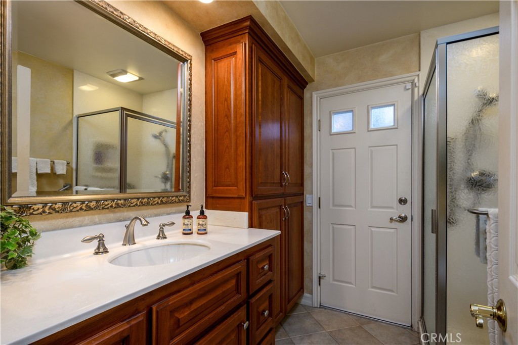 3001 Valera Fullerton, CA 92835 - Photo 16 of 25 a bathroom with a double vanity sink mirror and double