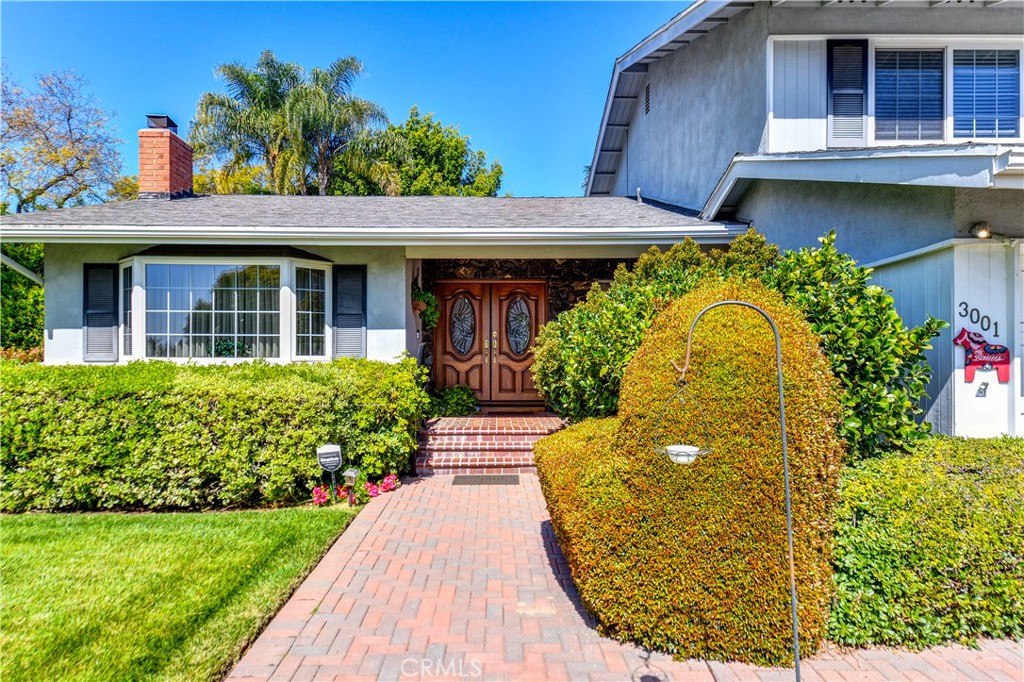 3001 Valera Fullerton, CA 92835 - Photo 2 of 25 a view of a house with a tub and garden