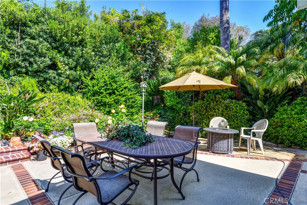 3001 Valera Fullerton, CA 92835 - Photo 22 of 25 a view of a chairs and table in backyard