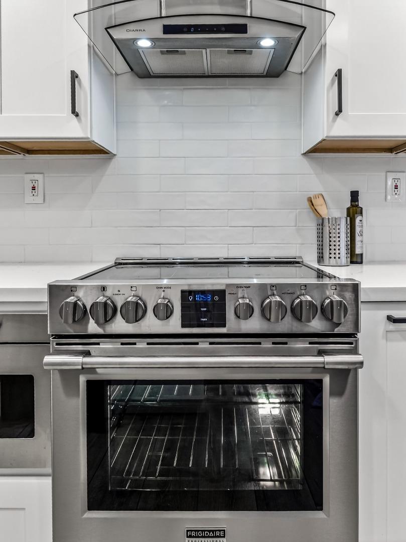 2084 Foxhall Loop San Jose, CA 95125 - Photo 17 of 44 a stove top oven sitting inside of a kitchen