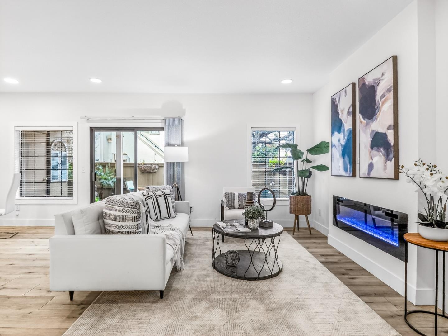 2084 Foxhall Loop San Jose, CA 95125 - Photo 2 of 44 a living room with furniture and a potted plant