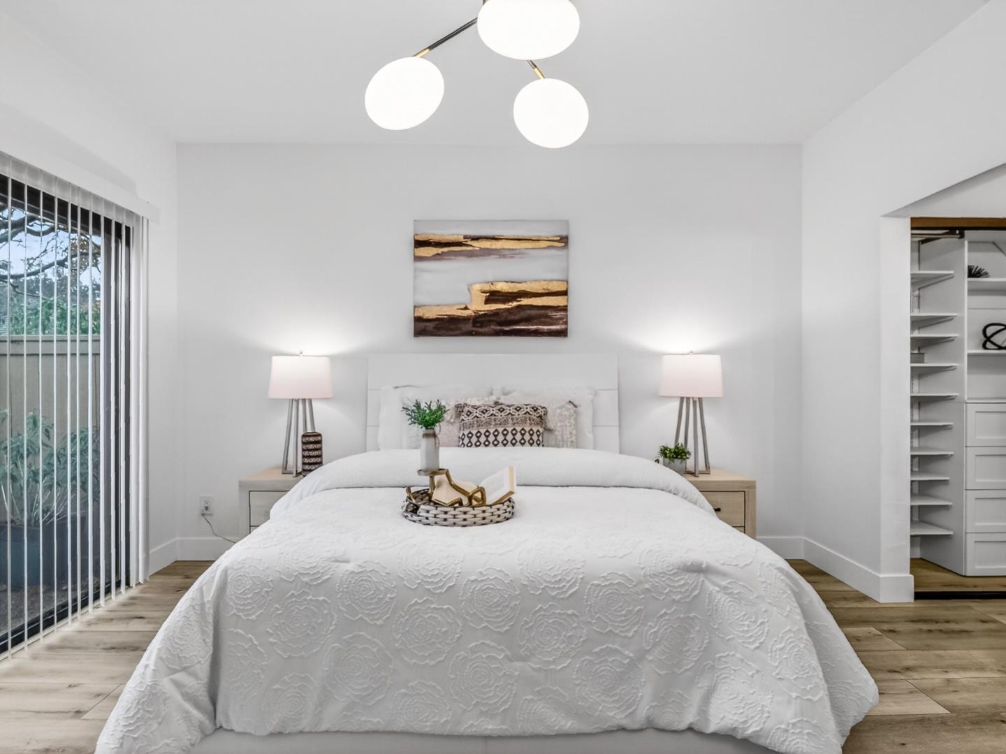 2084 Foxhall Loop San Jose, CA 95125 - Photo 28 of 44 a bedroom with a bed and a night stand