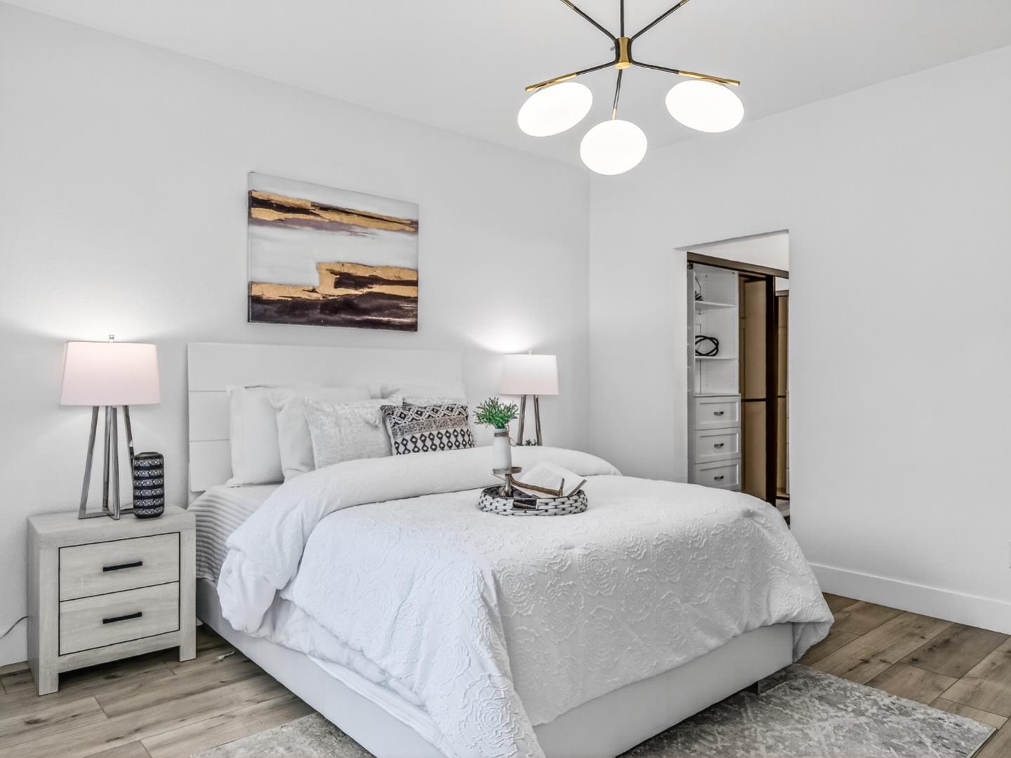 2084 Foxhall Loop San Jose, CA 95125 - Photo 29 of 44 a bedroom with a bed and a lamp