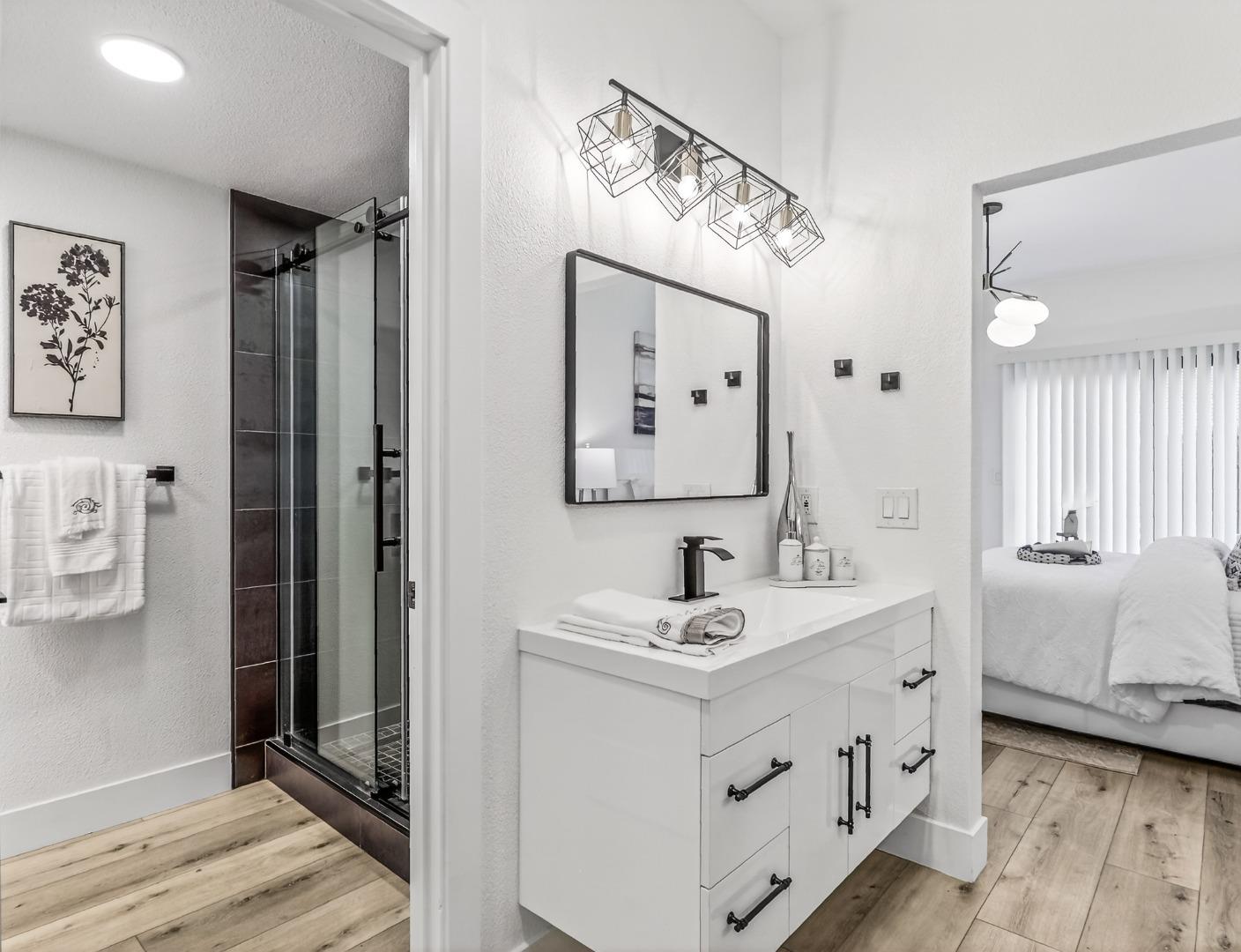 2084 Foxhall Loop San Jose, CA 95125 - Photo 34 of 44 a bathroom with a double vanity sink mirror and