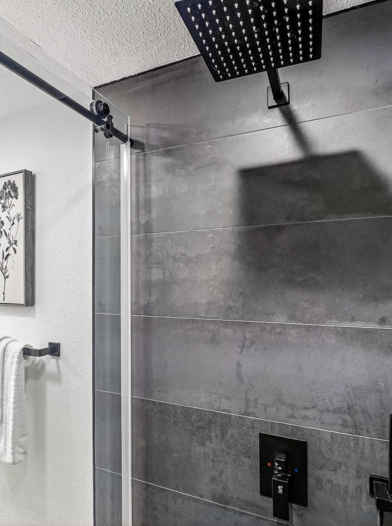 2084 Foxhall Loop San Jose, CA 95125 - Photo 35 of 44 a bathroom with a shower