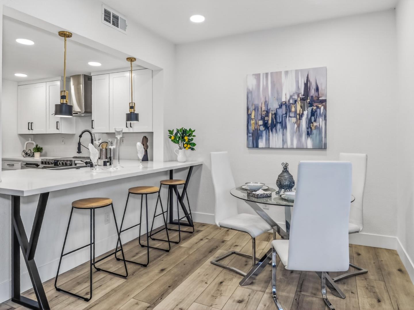 2084 Foxhall Loop San Jose, CA 95125 - Photo 10 of 44 a view of a dining room with furniture and wooden floor