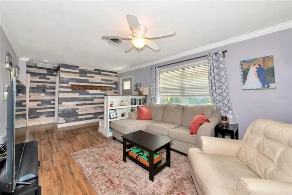 a kitchen with cabinets stainless steel appliances and a sink