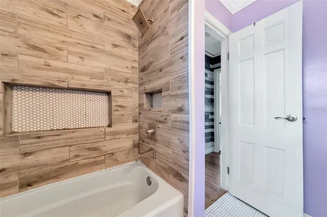 a view of a backyard with swimming pool