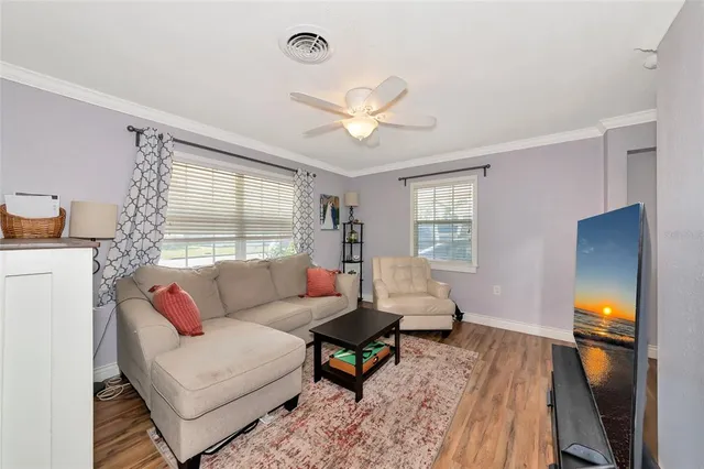 a kitchen with a white cabinets and white appliances