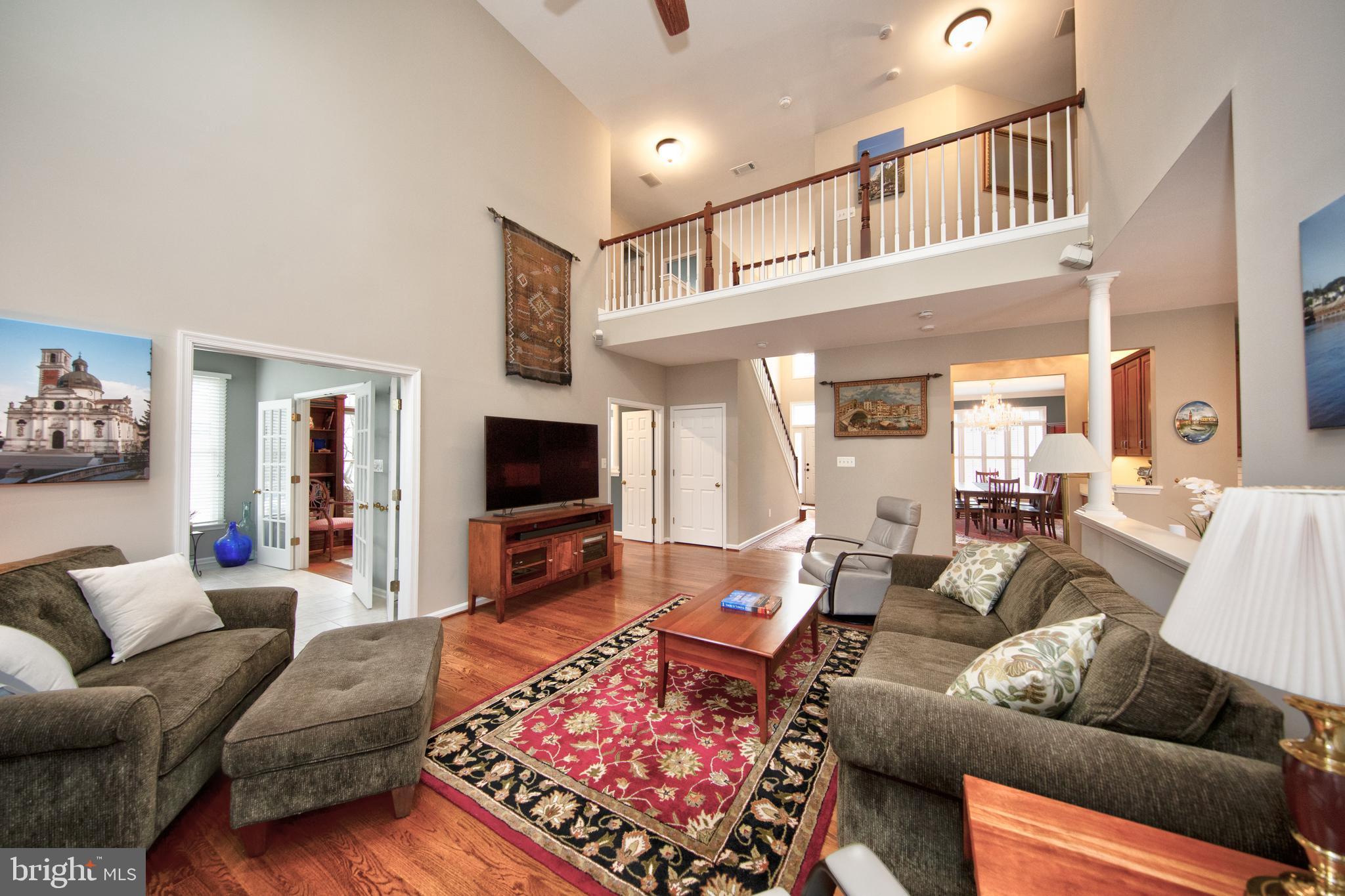 1407 Eagle Ridge Run Bel Air, MD 21014 - Photo 13 of 53 Family looking away from fireplace