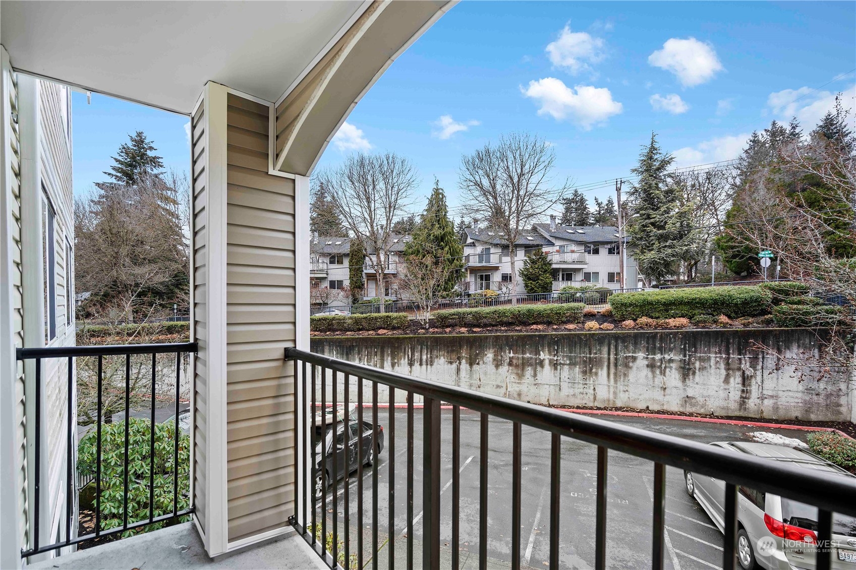 10709 Valley View Road, Unit B302 Bothell, WA 98011 - Photo 5 of 20 a view of a lake from a balcony