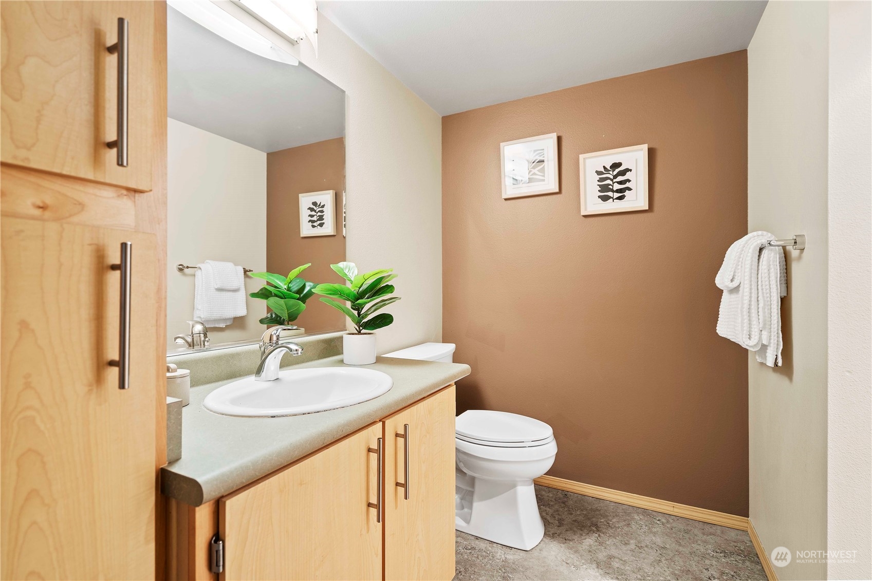 10709 Valley View Road, Unit B302 Bothell, WA 98011 - Photo 9 of 20 a bathroom with a sink and toilet