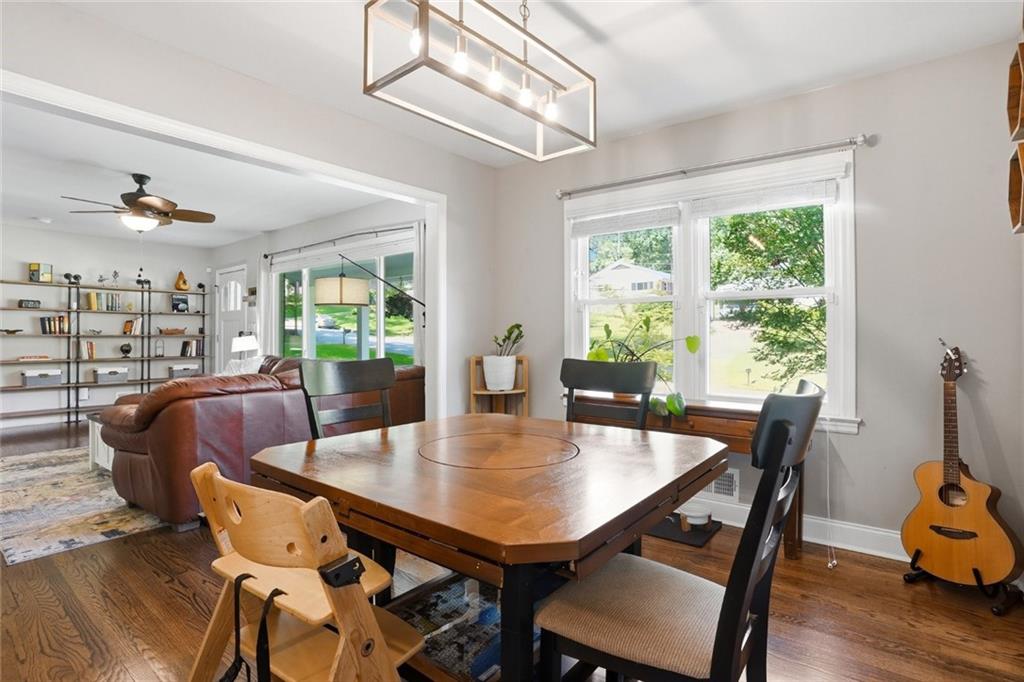 1430 Thomas Road Decatur, GA 30030 - Photo 10 of 42 a view of a dining room with furniture window and wooden floor