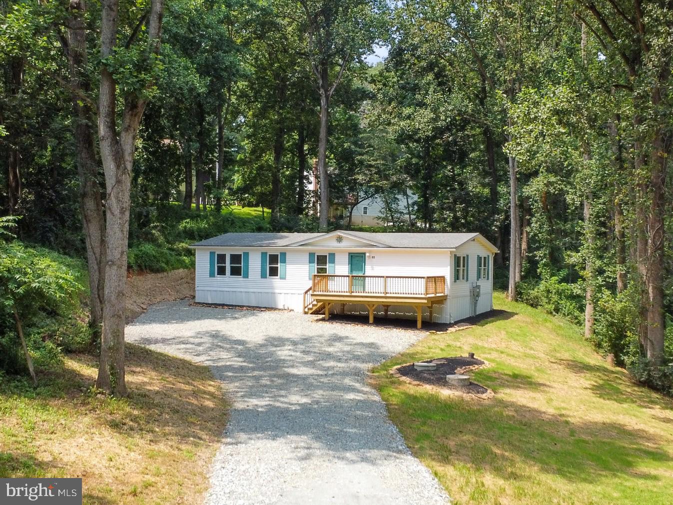 a view of a house with a big yard