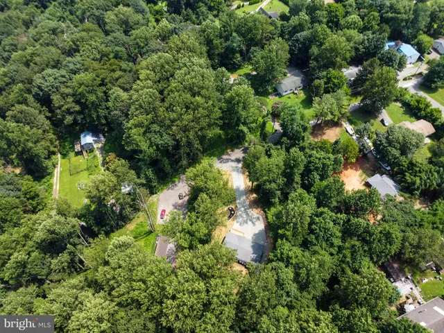 view of a house with a tree