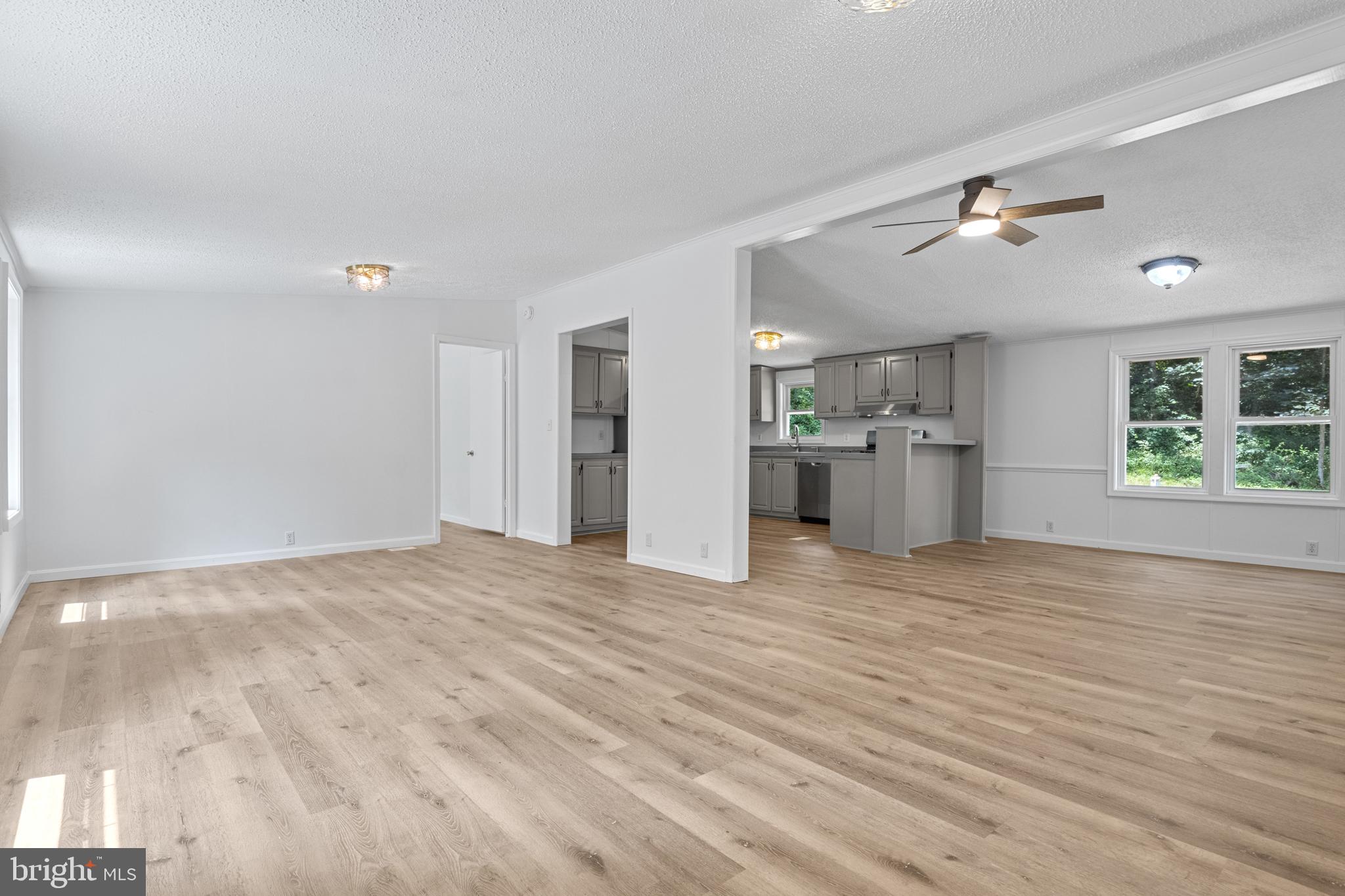 63 Cherry Road Airville, PA 17302 - Photo 8 of 49 Living Room With New Luxury Vinyl Plank Floors