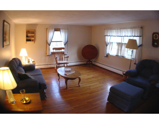 91 Birch Meadow Road Merrimac, MA 01860 - Photo 2 of 9 a living room with furniture and a window