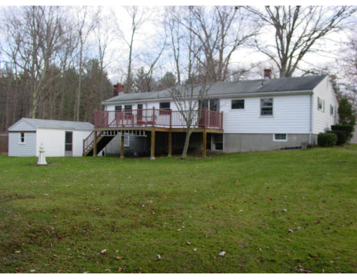 91 Birch Meadow Road Merrimac, MA 01860 - Photo 8 of 9 a front view of house with yard and seating area