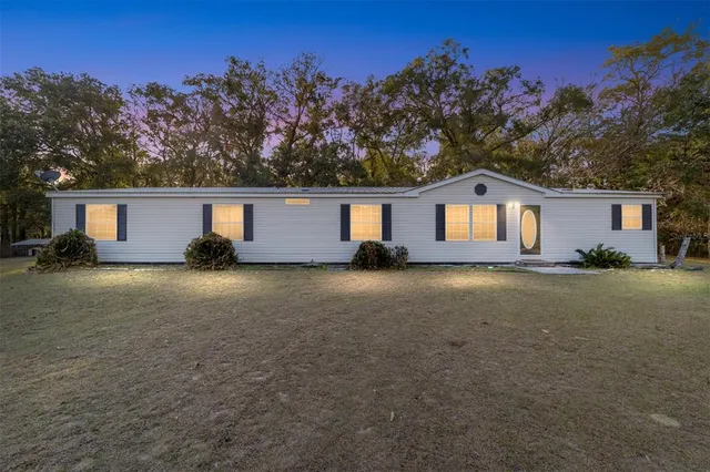 a house view with a garden space