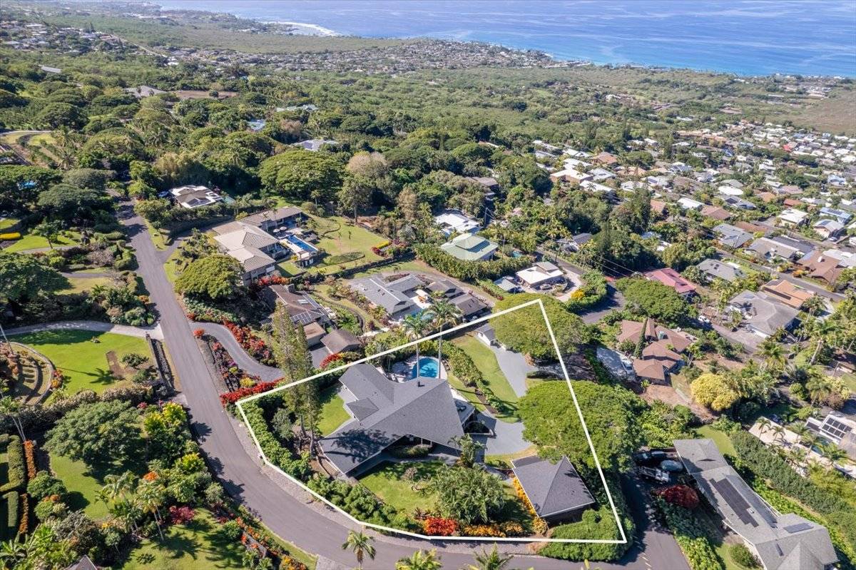 77-404 Pelenike Drive Kailua-Kona, HI 96740 - Photo 27 of 27 an aerial view of residential houses with outdoor space and trees