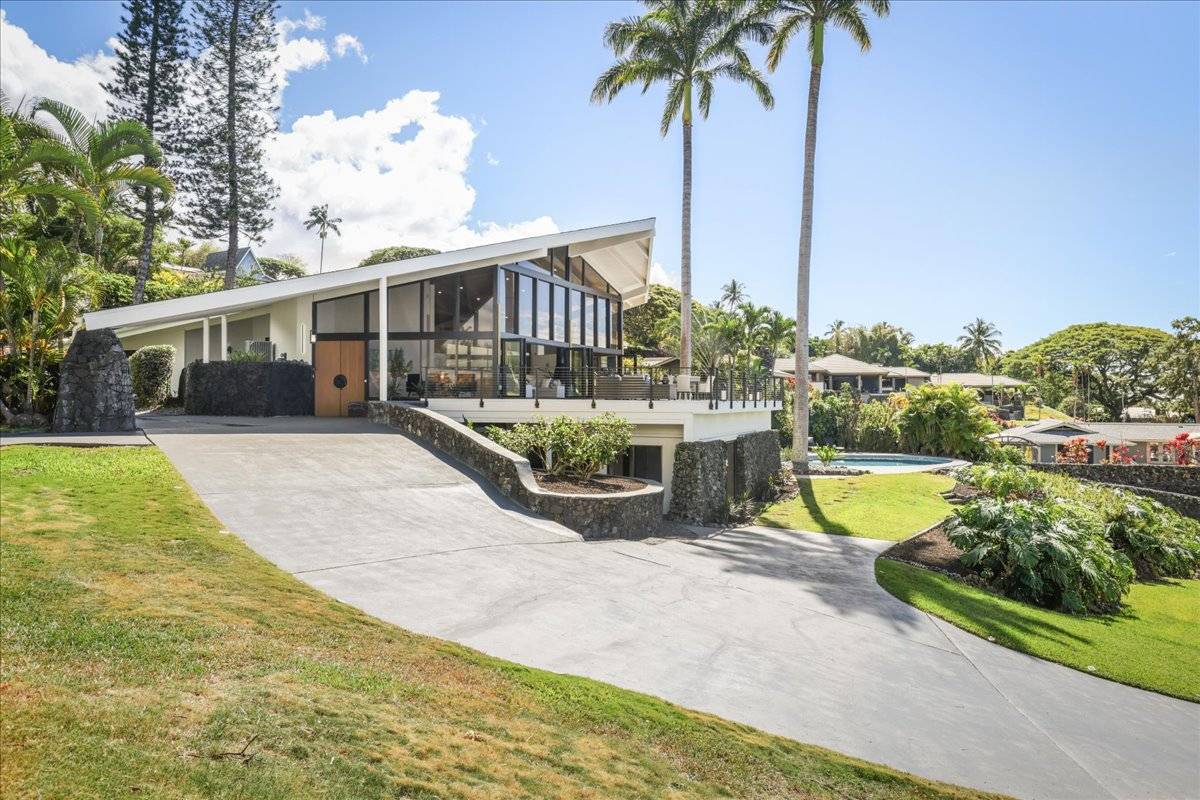 77-404 Pelenike Drive Kailua-Kona, HI 96740 - Photo 3 of 27 a view of a house with swimming pool and sitting area