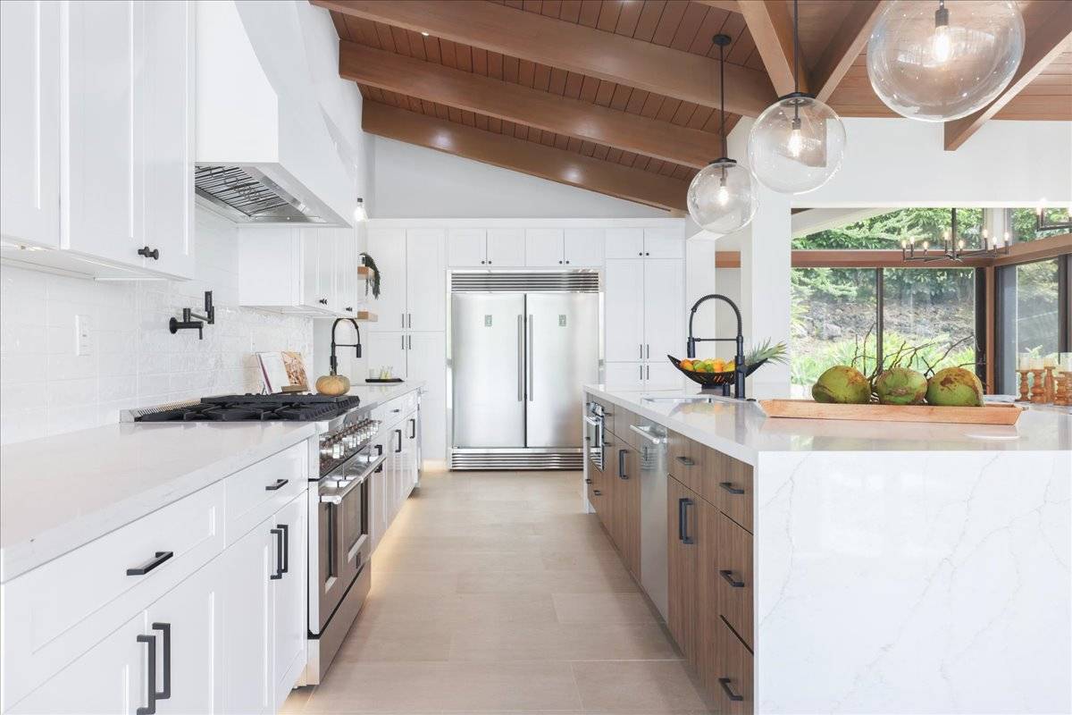 77-404 Pelenike Drive Kailua-Kona, HI 96740 - Photo 9 of 27 a kitchen with a stove and a sink