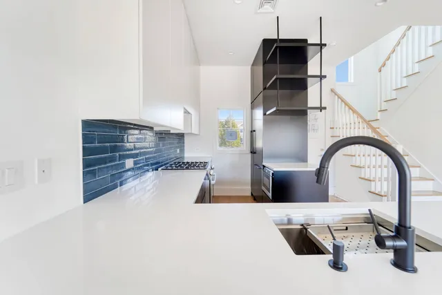 a view of living room with furniture and a window