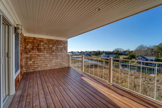 a view of roof deck with patio