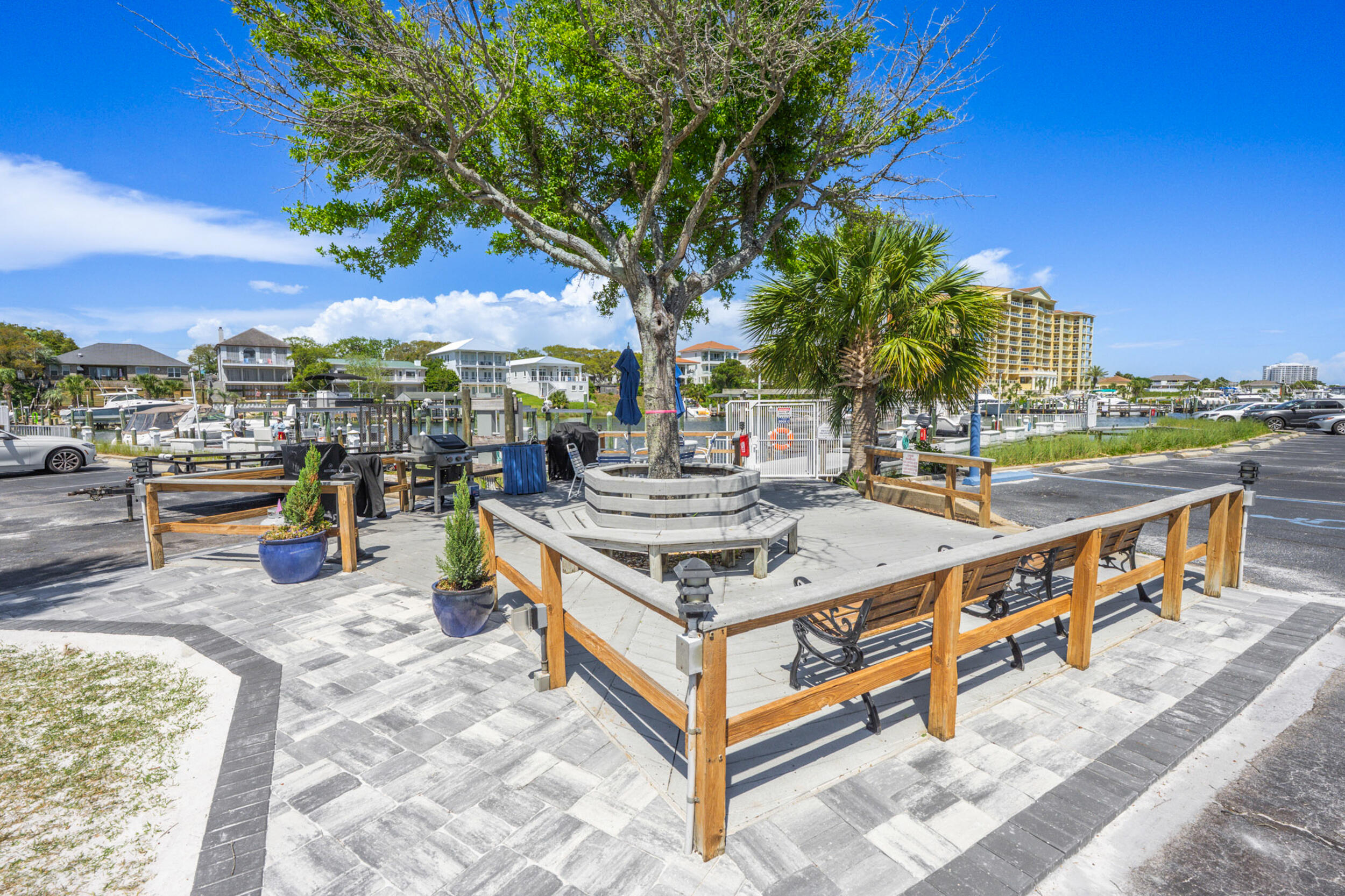 30 Moreno Point Road, Unit 502A Destin, FL 32541 - Photo 52 of 71 a view of a chairs and table in the terrace