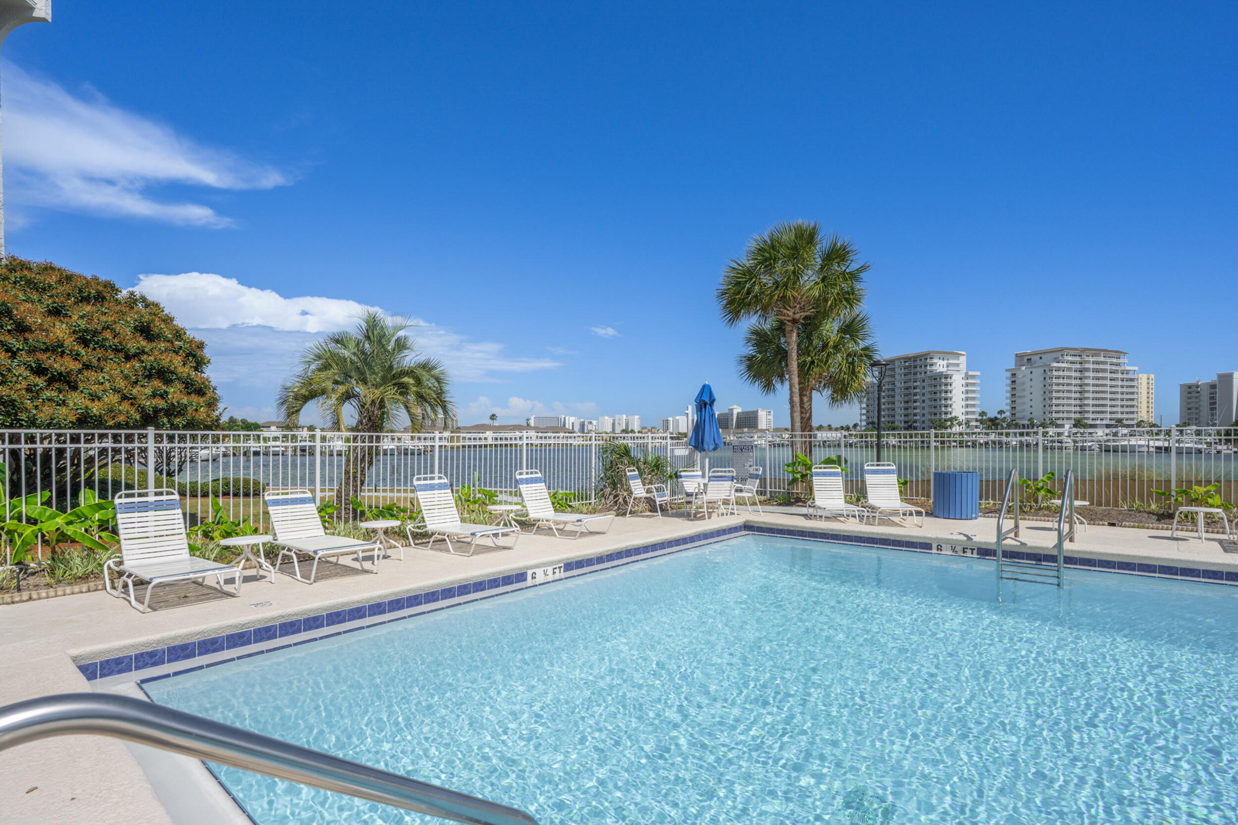 30 Moreno Point Road, Unit 502A Destin, FL 32541 - Photo 57 of 71 a view of a swimming pool and a terrace