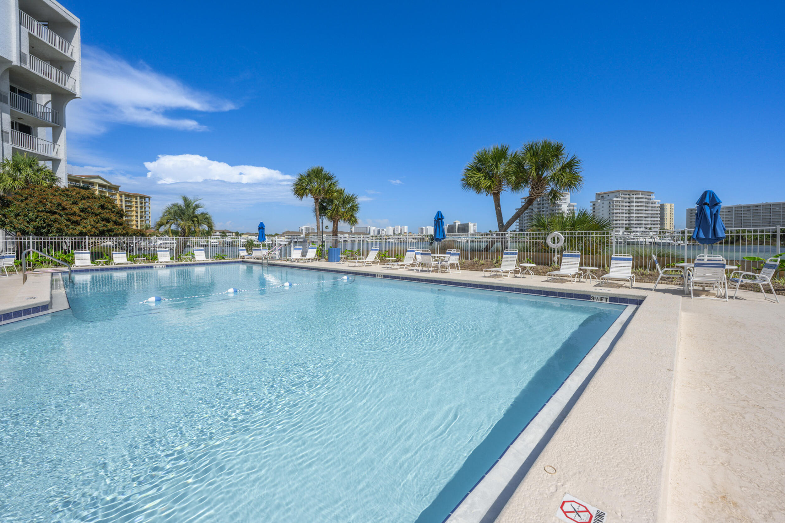 30 Moreno Point Road, Unit 502A Destin, FL 32541 - Photo 59 of 71 a view of a swimming pool and outdoor space