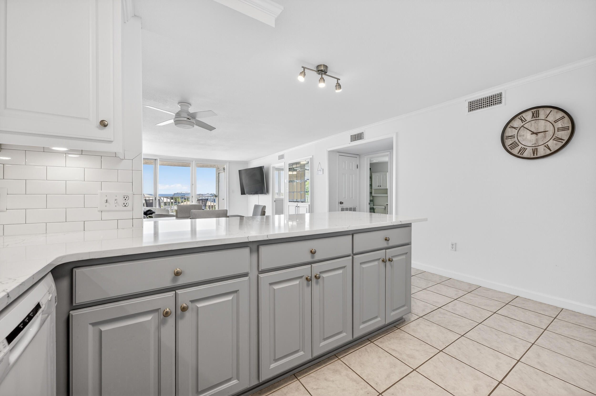 30 Moreno Point Road, Unit 502A Destin, FL 32541 - Photo 8 of 71 a bathroom with a sink and a mirror