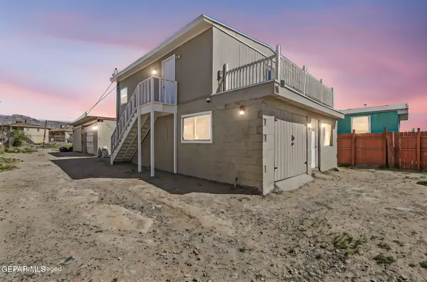 a view of a backyard of a house