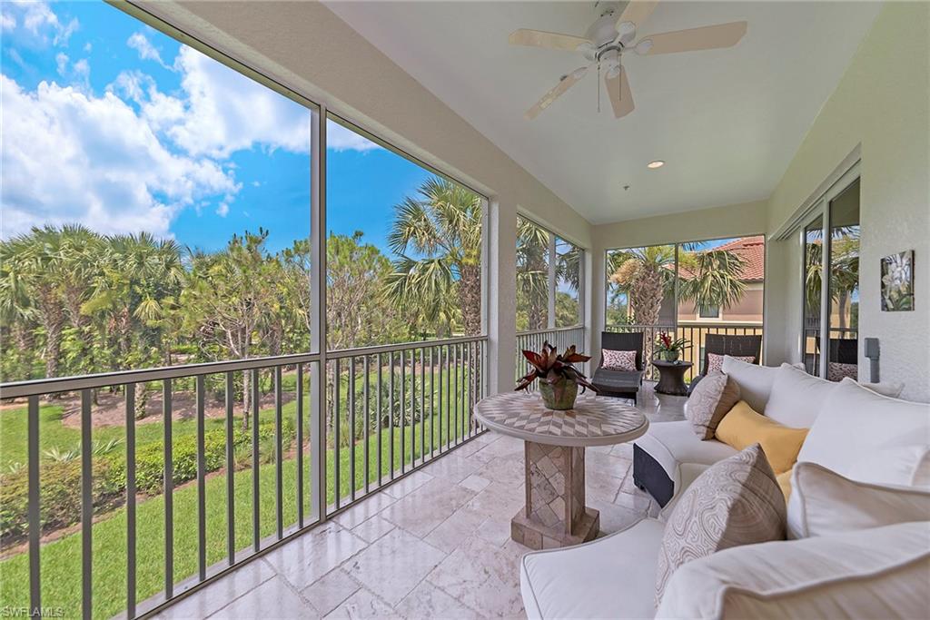 12014 Covent Garden Court, Unit 202 Naples, FL 34120 - Photo 20 of 50 Sunroom / solarium with stone tile floors and healthy amount of natural light