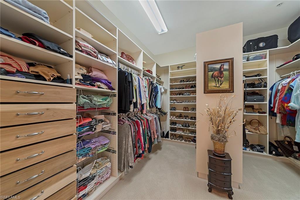 12014 Covent Garden Court, Unit 202 Naples, FL 34120 - Photo 27 of 50 Spacious closet with light carpet
