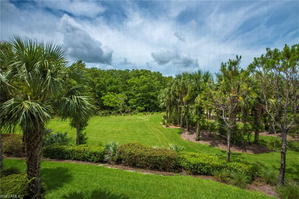 12014 Covent Garden Court, Unit 202 Naples, FL 34120 - Photo 32 of 50 Surrounding community with a yard