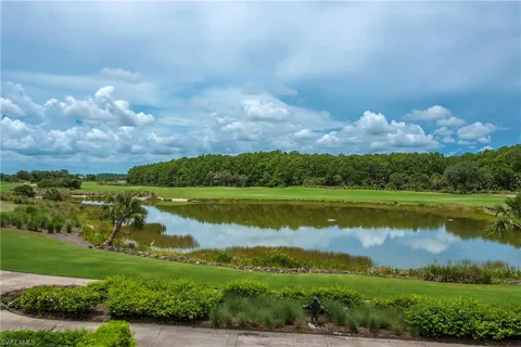 a view of a lake with a houses