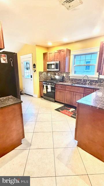 8 Stuart Avenue Glenolden, PA 19036 - Photo 6 of 24 a view of a kitchen with kitchen island